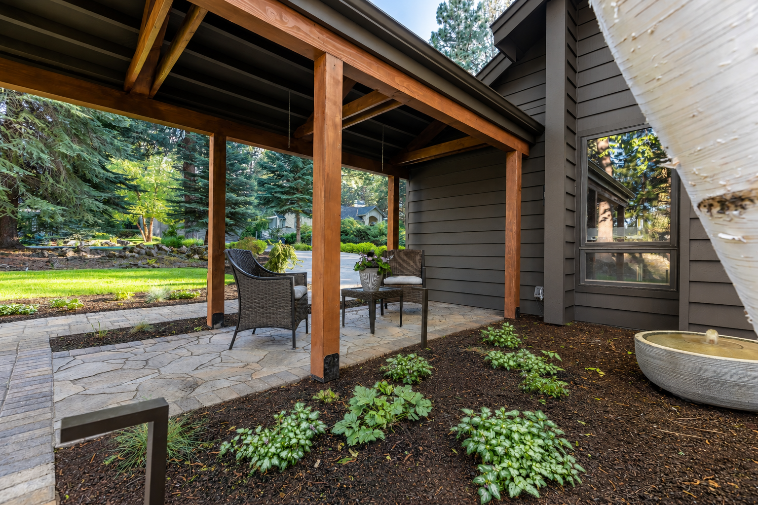 Mountain High — paver walkway leading to front door at dusk with path lighting