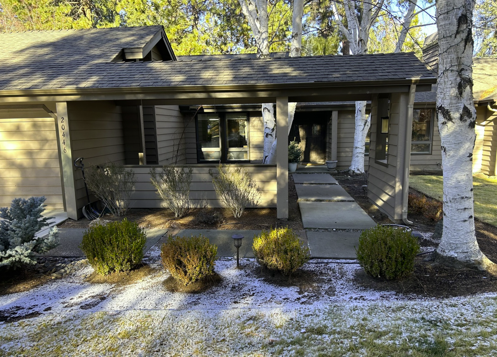 Mountain High entry before — Winter — original entry with old posts and concrete slab