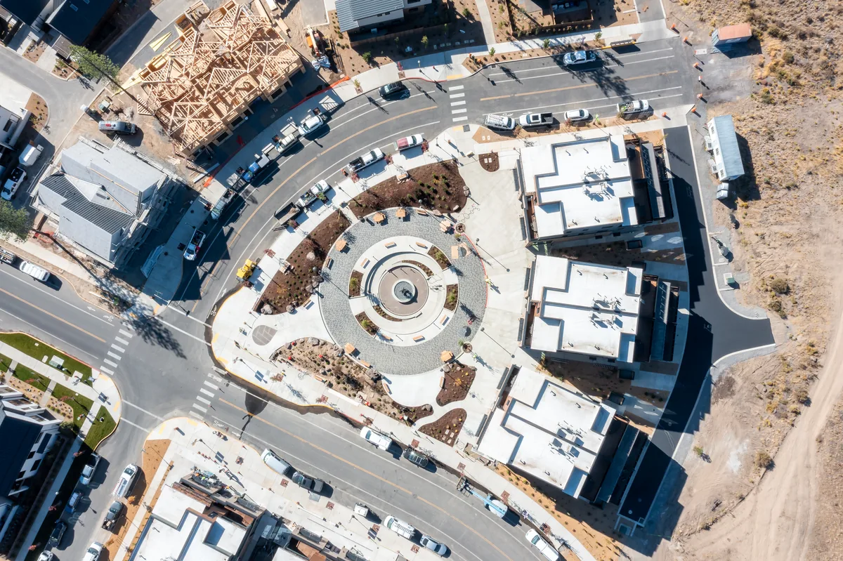 Discovery West Plaza — full aerial overview of circular paver plaza