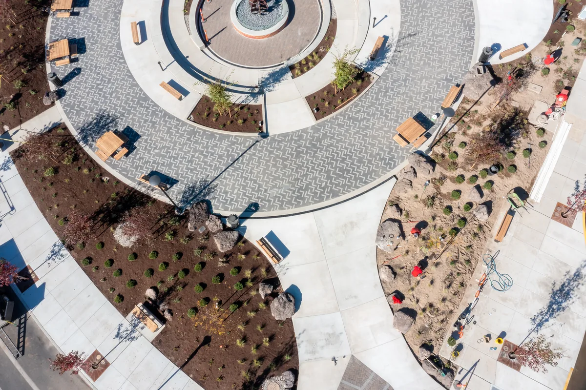 Discovery West Plaza — overhead view of circular paver pattern