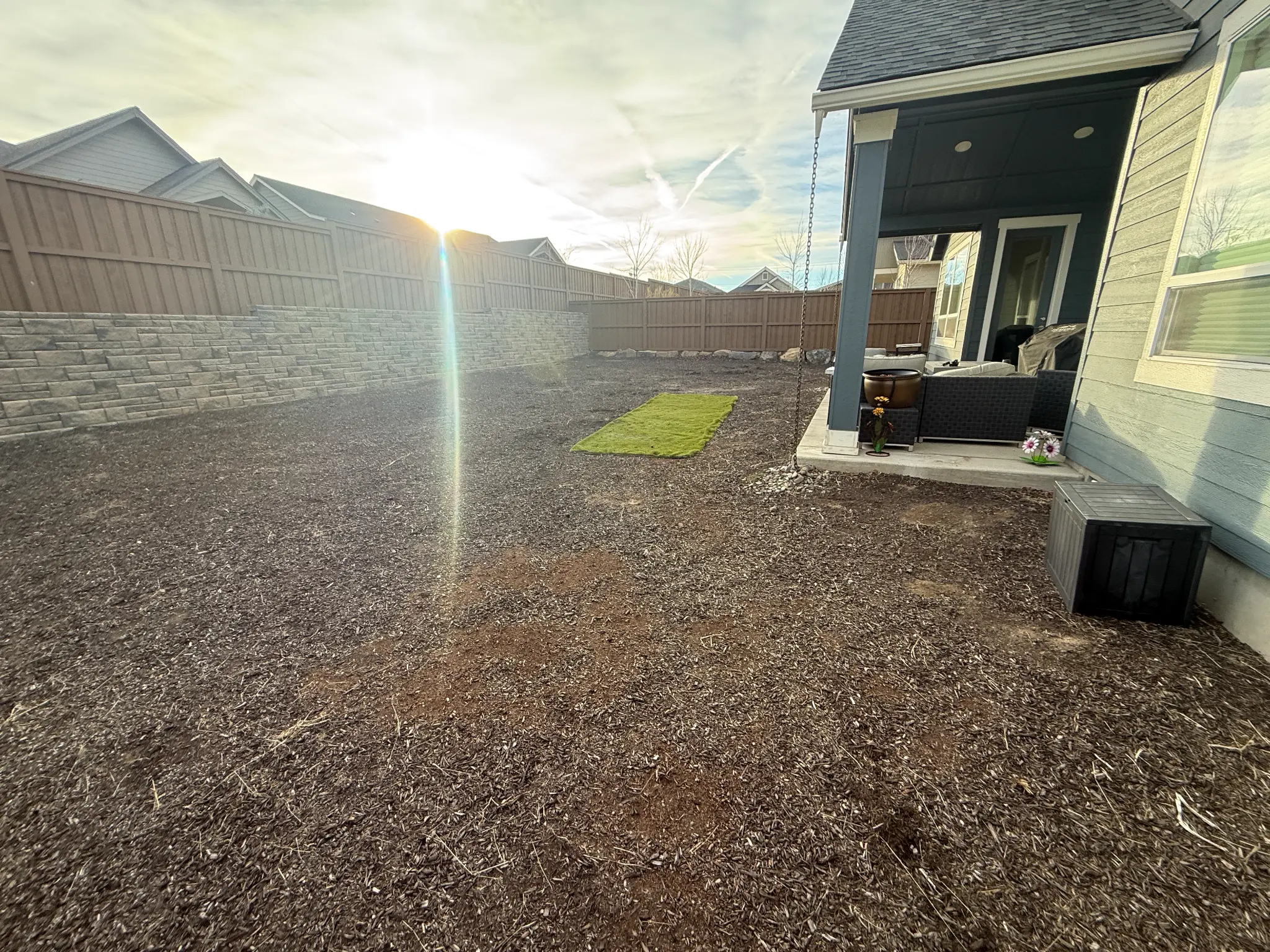 Bare dirt and mulch backyard before landscaping — Northeast Bend Oregon