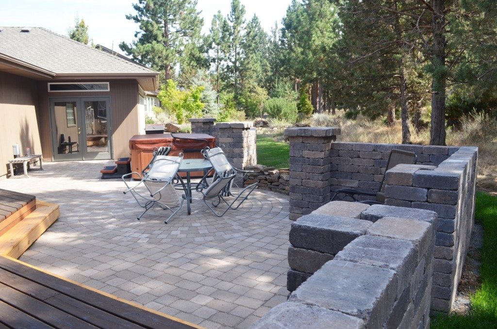 Awbrey Butte freestanding wall and paver patio extension — Bend, OR