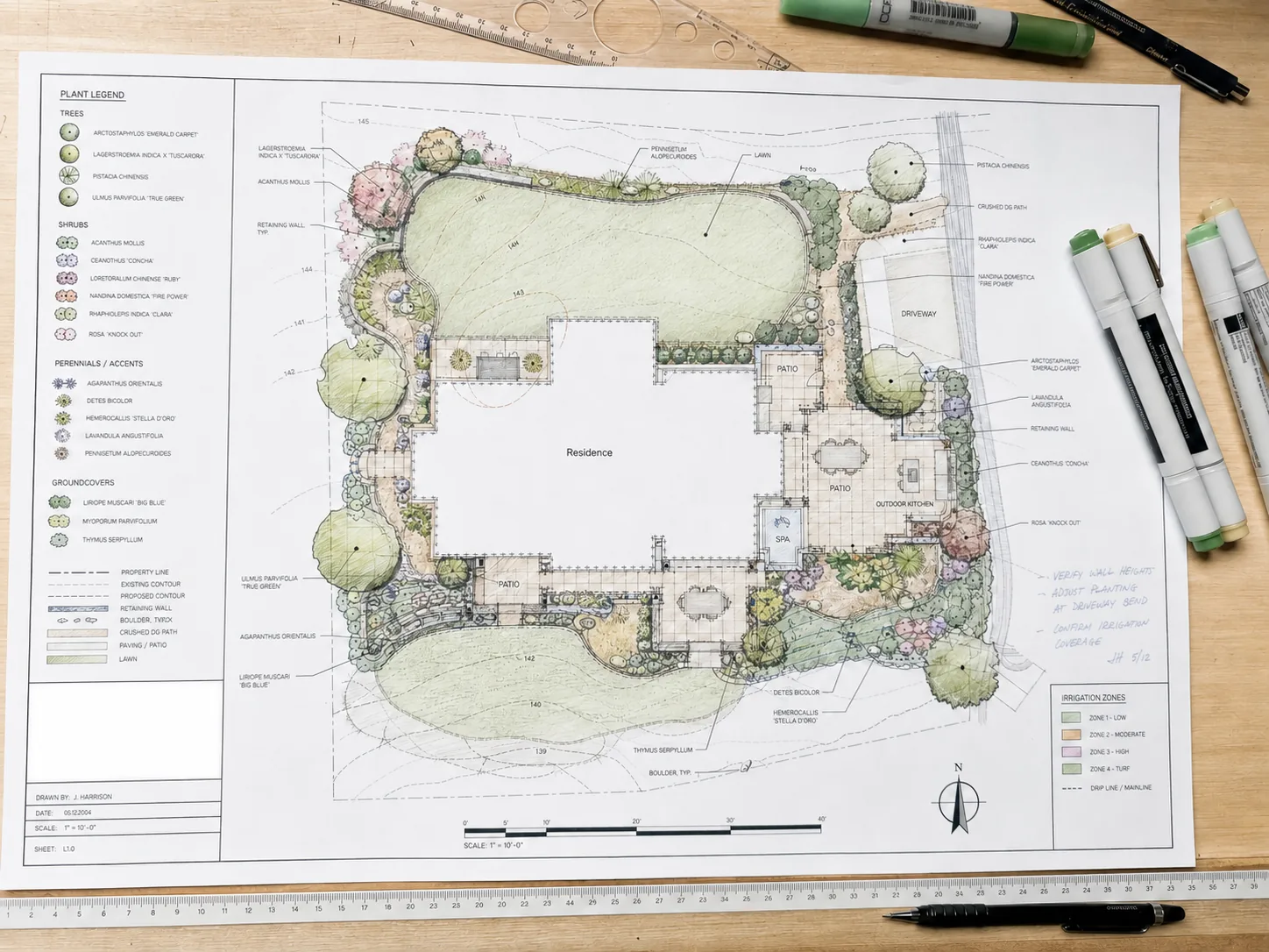 Professional landscape design CAD plan with plant legend and irrigation zones