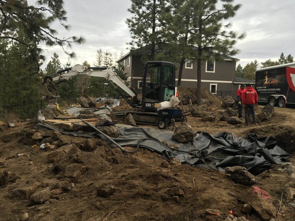 Isokern natural gas fireplace with Sebastian veneer and mahogany flagstone — Bend, OR